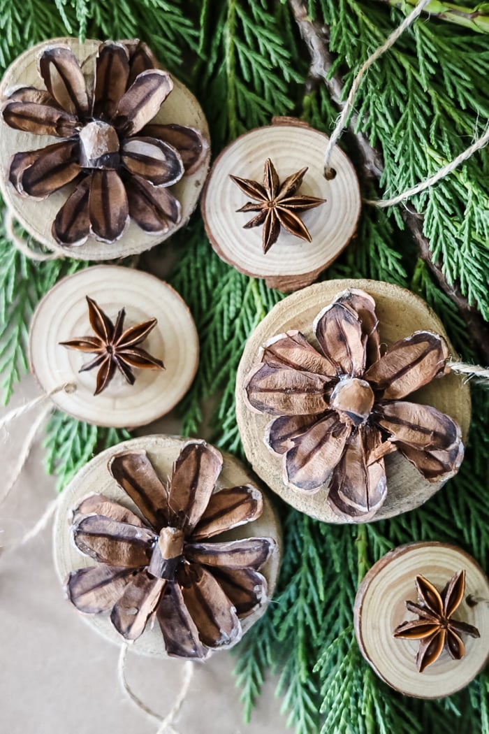 Create Your Own Rustic Christmas Ornaments with Wood Slices and Pinecones
