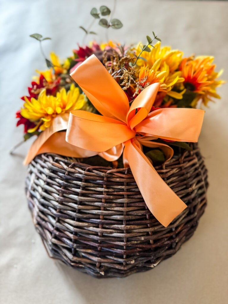 rattan wall basket with ugly flowers