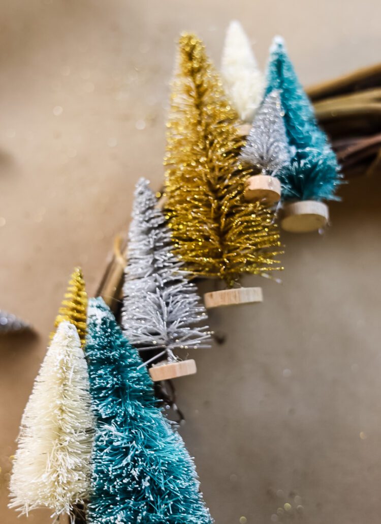 mini bottle brush trees on a wreath