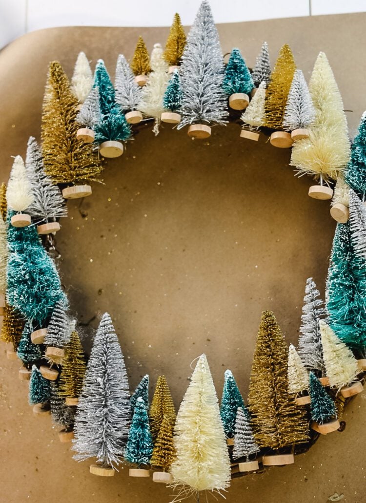 bottle brush wreath on craft table