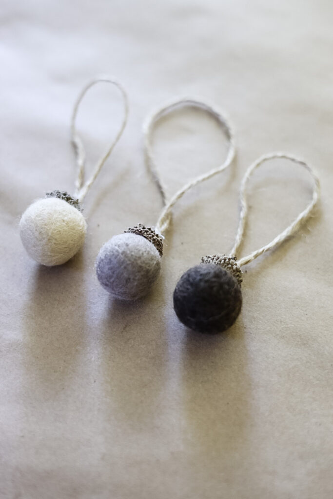 3 felt acorn ornaments in neutral brown tones