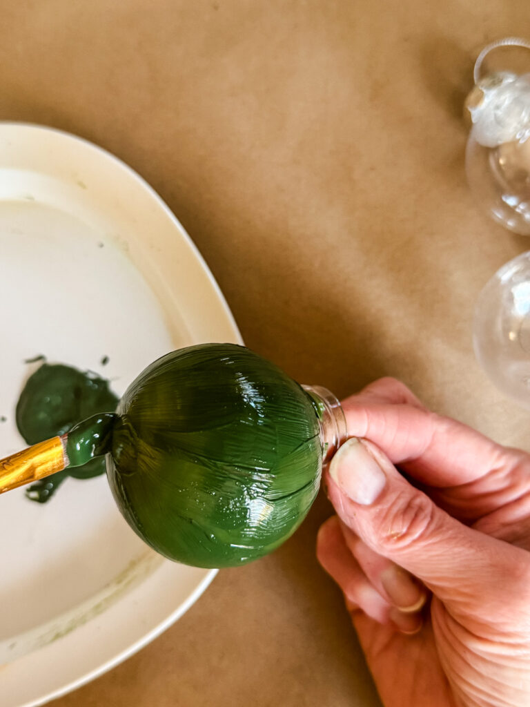 painting an ornament green