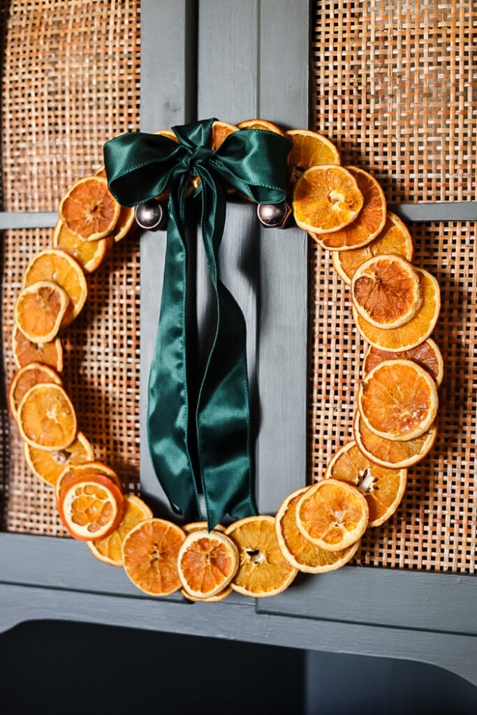 dried orange slice wreat with a green satin ribbon