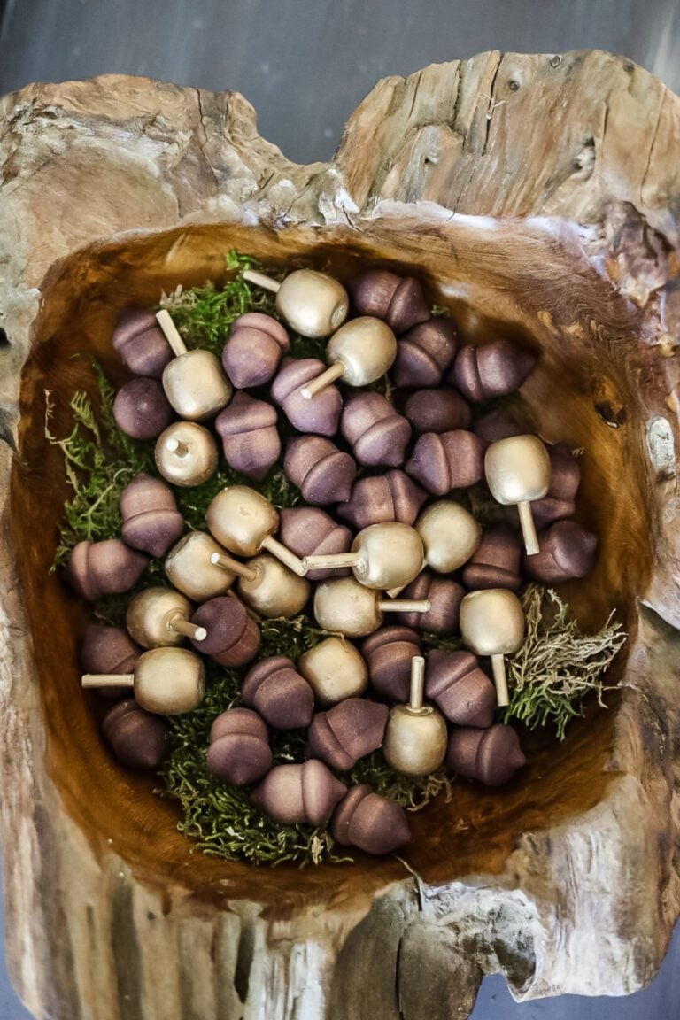 overview of decorative fall bowl display in teak wood bowl