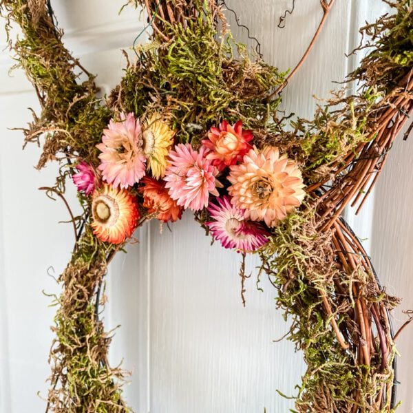 moss wreath with dried strawflowers