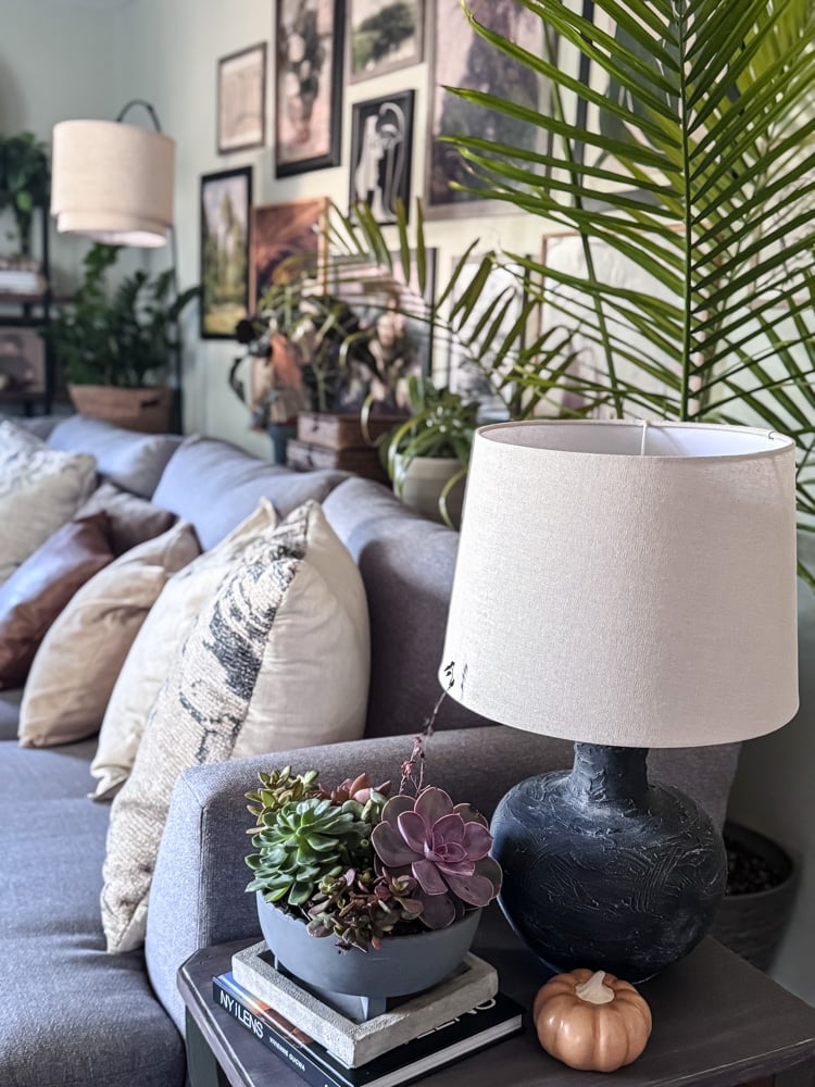 black table lamp on end table in living room